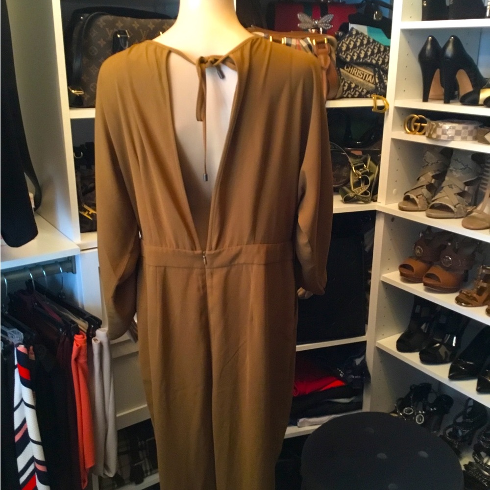 Brand New open back jumpsuit